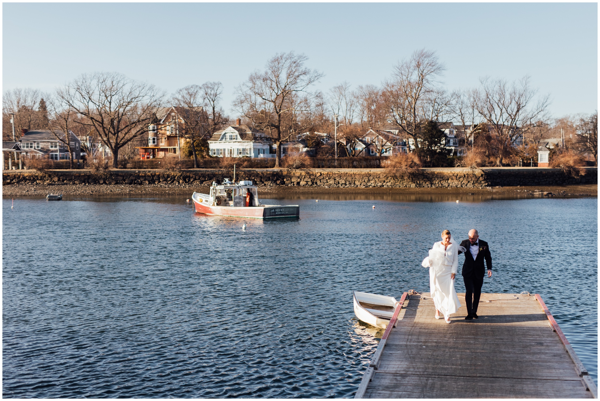 Bride and groom portraits on dock during winter wedding at Red Lion Inn in Cohasset MA
